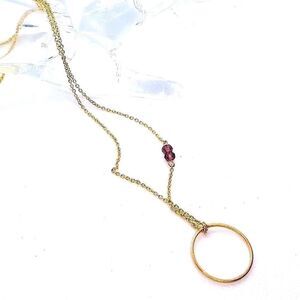 gold toned circle dainty  chain necklace.